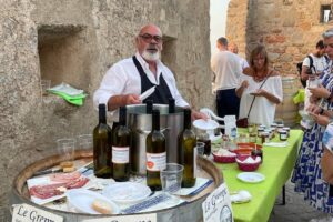 Banco Le Greppe durante l'evento a Giglio Castello, Piazzi i Lombi, di Sapori dentro le Mura